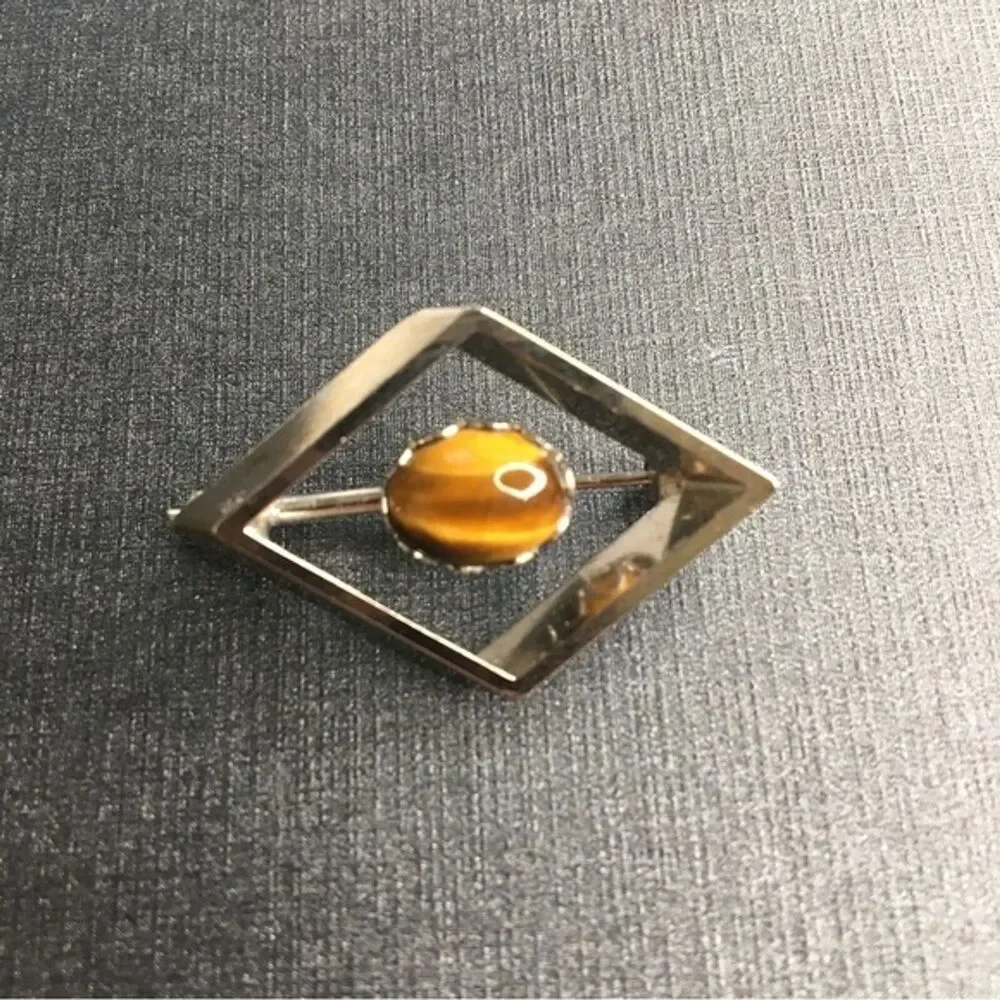 None brooch home please